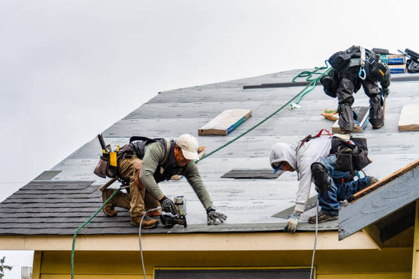 Professional Roofing technician working in Howell, MI